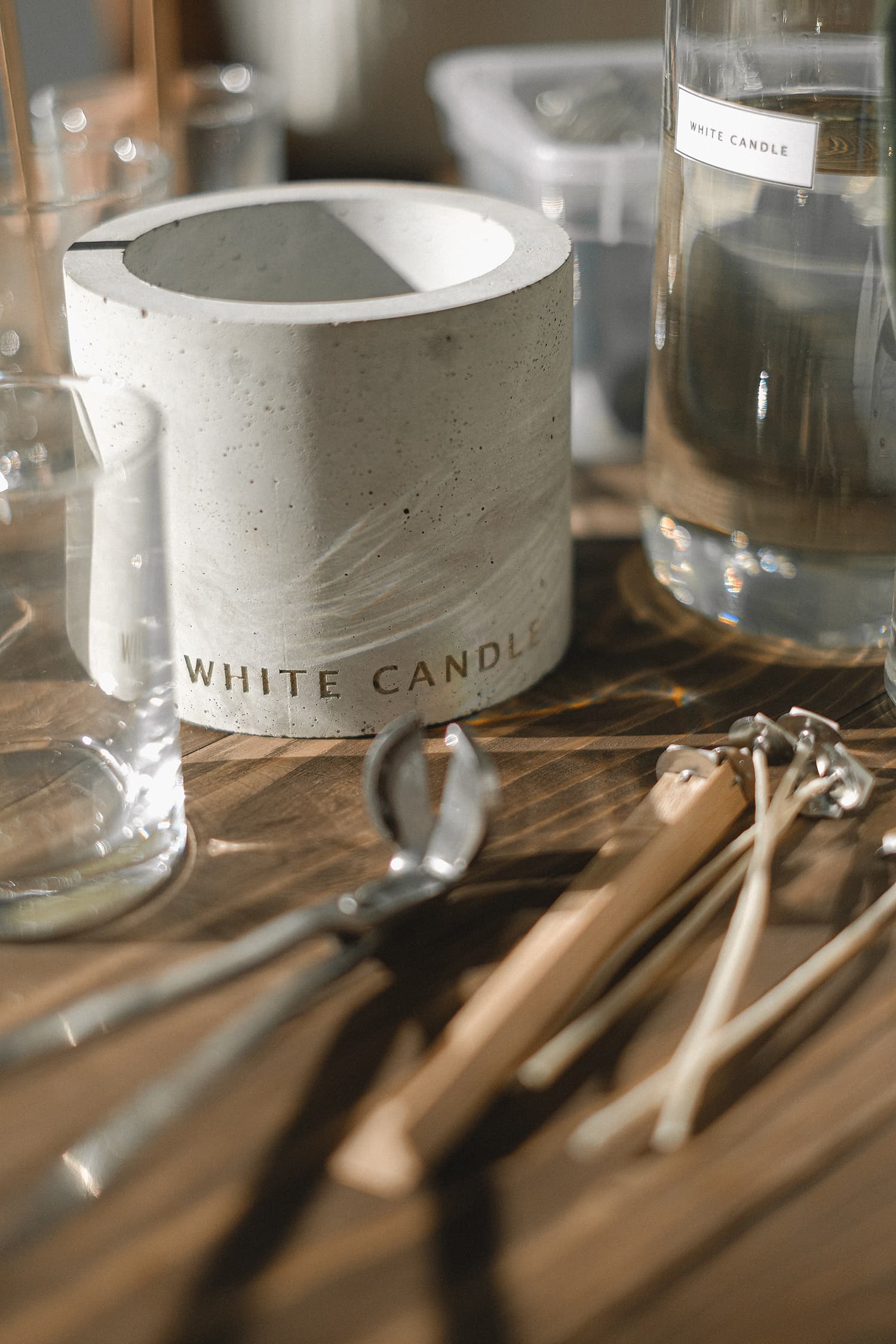Candle making supplies on wooden table